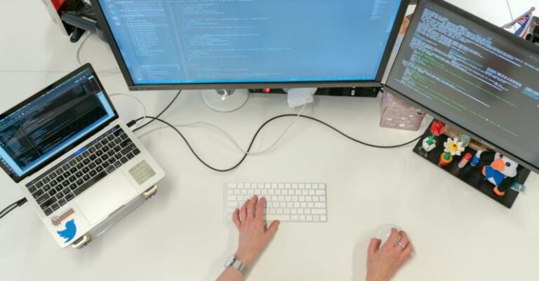 Software - Female Software Engineer Coding on Computer