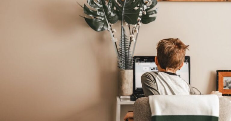 Laptop - A Boy Studying Online Using Laptop