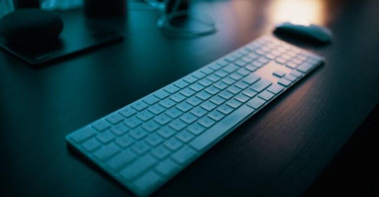 Computer - Apple Magic Keyboard With Numeric Pad on Table Near Wireless Mouse