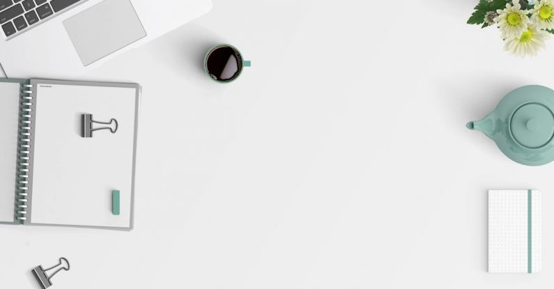 Laptop - Flat Lay Photography of Macbook Pro Beside White Spiral Notebook and Green Mug