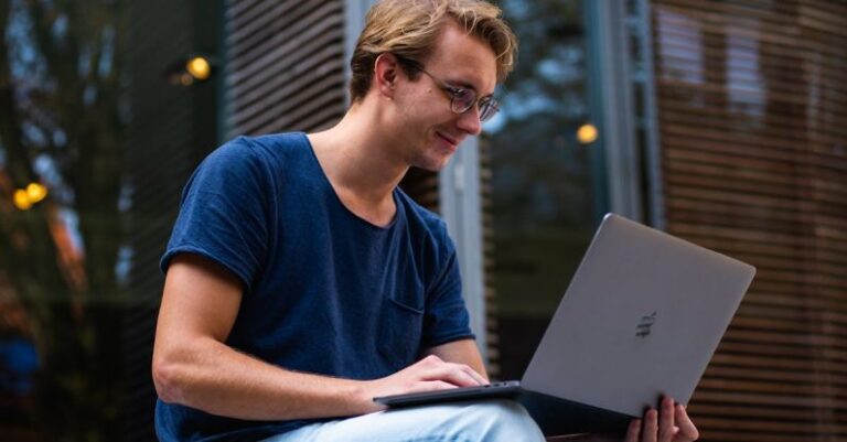 Laptop - Selective Focus Photo of Man Using Laptop